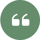 A green circular icon with white quotation marks.